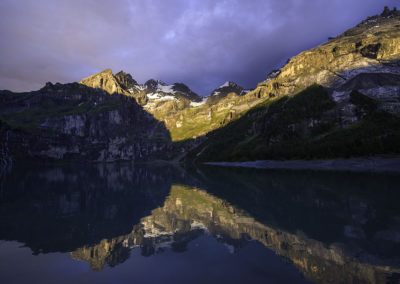Evening Alpenglow on the Blumlisalp mountains above Kandersteg's Oeschinensee